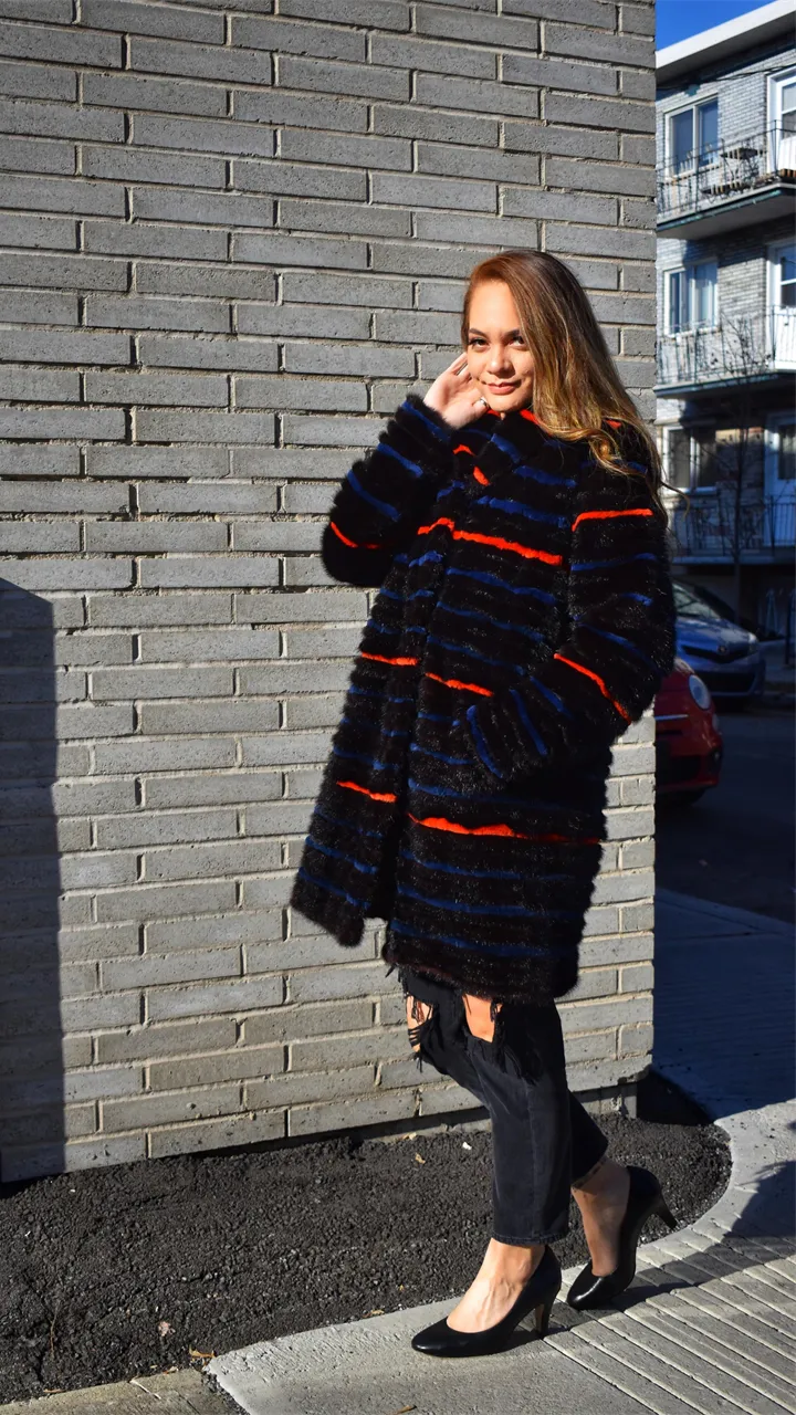 Mink coat with horizontal sheared beaver inserts